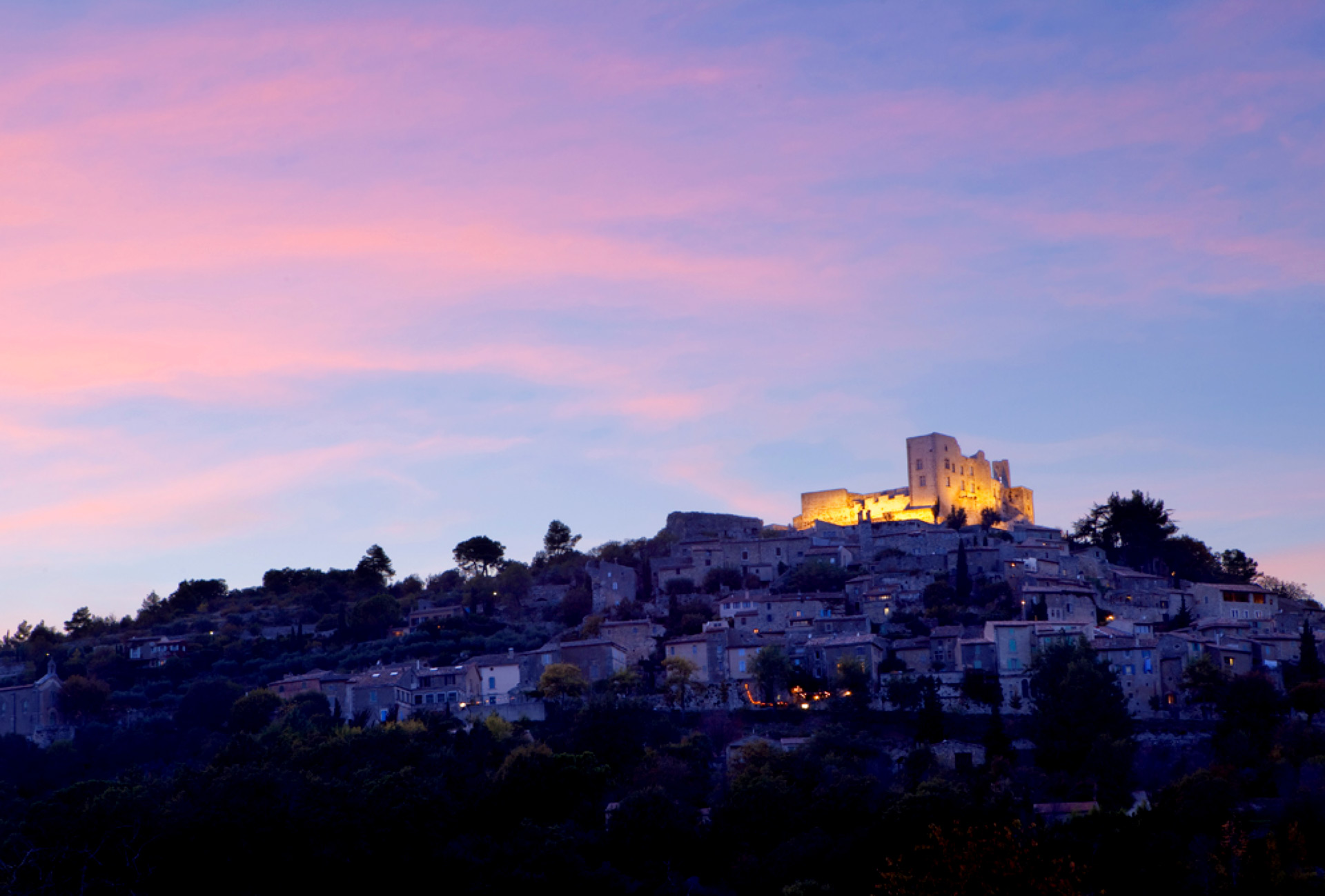 Views of the Lacoste chateau at night